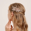 Rose gold bridal hair comb with pink flowers and crystals on a model's hair - 10# Rose Gold Hair Comb