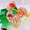 Sparkling rhinestone rooster keychain with opal stones and colorful enamel finish - Rooster