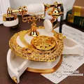 Macro detail of retro telephone music box with golden accents and jewelry drawer - White European Telephone Music Box