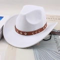 White felt cowboy hat with brown studded band placed on a book in a lifestyle setting - Wave Pattern Strap / White