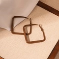 Macro detail of geometric square brown lacquered earrings on textured beige linen background - Silver Pin - Brown Square Hoop / Brown