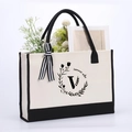 Beige cotton canvas tote with black trim, striped scarf and floral V print - Letter-V