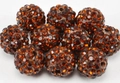 Macro view of stacked amber Shamballa beads with hand-set sparkling crystals - 10mm / Amber Brown (12)