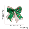Detail view of 10cm Christmas linen plaid bow with holiday prints and dimensions - Green Fabric Stocking Style