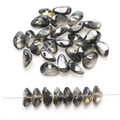 Close-up of 8x17mm dark rainbow glass beads with iridescent finish for DIY jewelry - Half Gun Black Purple