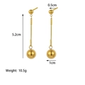 Detailed view of 18K gold-plated ball drop earrings with dimensions 5.2cm and 10.5g weight - Double Ball Drop Earrings / Gold