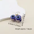 Detail shot of the evil eye hair claw clip showing dimensions 3.5cm by 2.8cm - 3.5cm Cherry Style Eye Claw Clip
