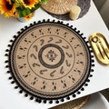 Round jute placemat with black boho patterns and pom-pom trim on a cozy table setting - Style 4 Black (Pom-poms)
