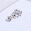 Macro view of S925 sterling silver connector clasp with pavé cubic zirconia - Platinum Twist Small Buckle