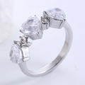 Bague hip hop en acier inoxydable argenté avec trois zircons clairs en forme de cœur - US 6 / Acier + Zirconia Blanc