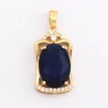 Vintage gold-plated pendant with oval blue gemstone and cubic zirconia accents - Dark Blue/Oval
