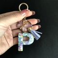 Detail of resin letter P keychain with heart sequins, purple butterfly and tassel - Letter P / Butterfly Tassel 8-Shape Buckle