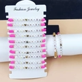 Pink bohemian clay bead bracelet set with gold accents and Team Bride letter beads - 12pcs Set / Pink