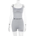Detail of grey knitted two-piece set featuring square neck top and high-waist shorts - S / Gray