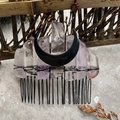 Macro detail of natural amethyst crystals and black moon on handmade bridal hair comb - Light Amethyst Black Moon