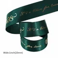 Dark green satin Christmas ribbon with gold foil text and 25mm width for gift wrapping - Dark Green Satin with Gold Love & Christmas Text (Style 12)