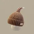 Brown knitted kids hat with white pompom and ear protection for winter warmth - Christmas Horn Hat Brown (for 2 Months To 2 Years Old)