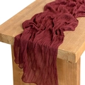 Close-up of deep red cheesecloth table runner with rustic wrinkled texture on wood - 90*300cm / Burgundy