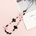 Pink and black heart bead phone lanyard with white pearls on a soft pink background - Pink Black Heart (K877)