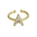 Close-up of 18k gold brass ring with pearl-encrusted letter A and adjustable opening - Letter A / Gold