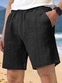 Detail of black herringbone texture fabric and drawstring on men's casual summer shorts - S / Black