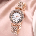 Luxury rose gold quartz watch with full diamond crystals on pink silk background - Roman Rose Gold