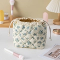 Quilted floral cosmetic bag, portable travel makeup pouch with drawstring closure for daily use. - Blue Gourd Floral