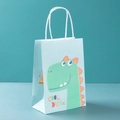 Light blue gift bag featuring a cute green cartoon dinosaur and white rope handles - Naughty Dragon