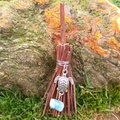 Mini witch broom charm with silver turtle pendant and blue gemstone on mossy background - 10cm / Branch Broom + Turtle + Random Stone