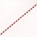 Detail view of a silver bracelet featuring alternating red and clear zircon stones - Platinum Plated - Alternating Red & White