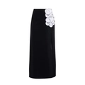 Detail of high-waist black skirt with side slit and white 3D floral decorations - Black Wrap Skirt