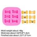 Pink silicone mold featuring 6-cavity mini bone shapes with paw prints for DIY crafts - Dog Bone Paw Print Shaped Mold (B807) / Pink