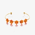 Stainless steel bangle featuring orange beaded flower charms and 6cm diameter - Orange (Polished Flower Bangle)