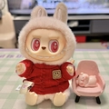 Labubu plush doll wearing a beige rabbit hat and a red knitted sweater outfit - Red Smiley Face Pin / First And Second Generation Keychains Are Compatible With La Cloth Dolls. Dolls Not Included.
