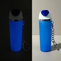 Glow-in-the-dark blue silicone keychain holder for travel bottles and lotions - Night Light Royal Blue