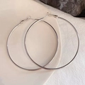 Polished silver oversized hoop earrings with a sleek mirror finish and minimalist design - 7cm / Silver
