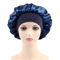 Detail of navy blue satin sleep bonnet featuring a wide elastic band on a mannequin head - One Size / Navy Blue