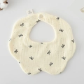 Soft cream 100% cotton gauze baby bib with black bow patterns and petal wavy edges - Gauze Flower Scarf - Black Bow