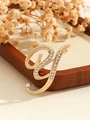 Elegant gold letter Y brooch featuring sparkling rhinestones and a streamlined design - Gold Letter Y