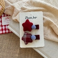 Detail of red plush and plaid star hair clips with blue pom-poms for children - Star Pom-pom Pair
