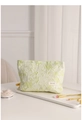 Close-up of light green floral jacquard makeup bag with cosmetic brushes on a tray - Large / Jacquard Moss Green