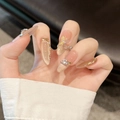 Handgemaakte champagne cat-eye kunstnagels met 3D-vlinder en luxe strass-steentjes - Extra Klein (XS)
