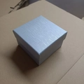Square light blue watch gift box with vertical lychee texture on brown cardboard - Silver Brushed Texture