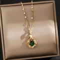Elegant gold chain necklace with deep green drop-shaped pendant in a luxury jewelry box - 71#XL1997-22