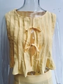 Detail of light yellow pleated sleeveless top with bow tie closures and textured fabric - Yellow Top