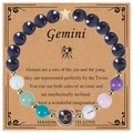 Detail of Gemini zodiac bracelet with blue goldstone and multi-colored beads on display card - Gemini