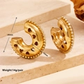 Detailed view of 35mm gold C-hoop earrings with hollow hearts and zircon accents - Hollow Rhinestone Gold Heart Style (F705)