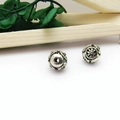 Two Tibetan silver hollow round beads with vintage ethnic patterns for jewelry making - Dharma Wheel