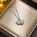 Elegant silver shell necklace with sparkling stones and a single pearl centerpiece - 8834 Steel-colored Shell