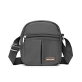 Minimalist grey nylon crossbody bag with adjustable wide black strap and front pockets - 16*7*19cm / Concrete